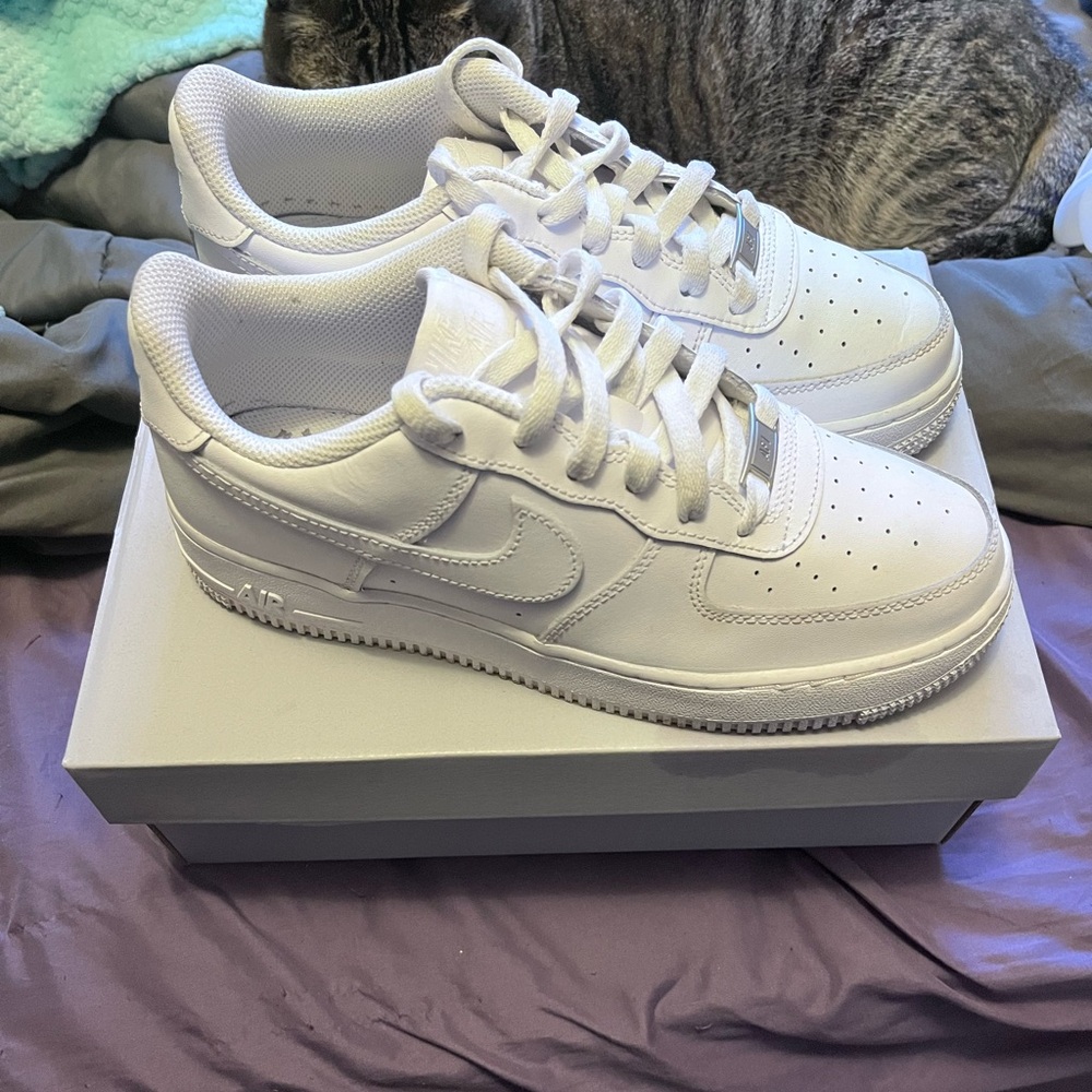 White Air Force 1s. Pretty much brand new I only wore them twice.